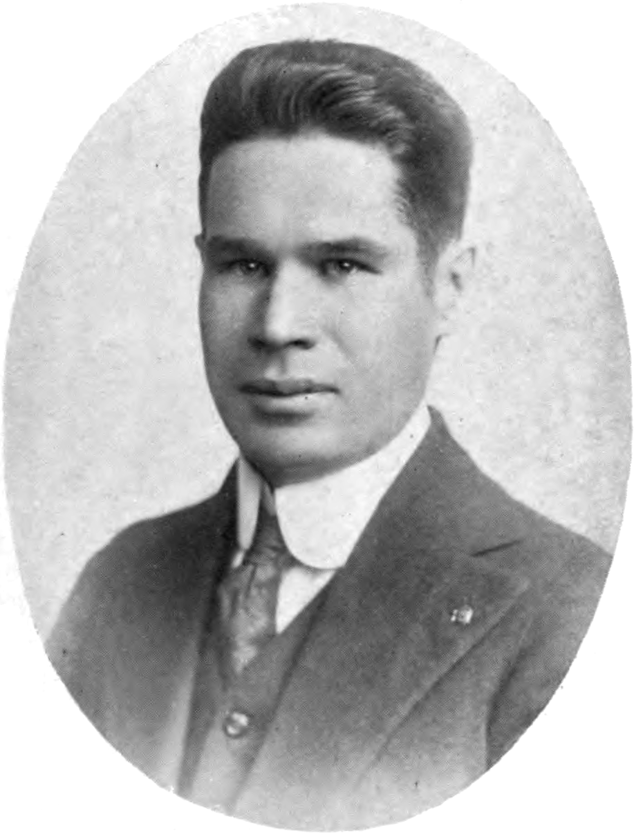 Raymond S. Sullivan, a hispano man from Alamosa, photographed here in a suit.