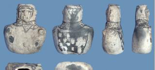 Ceramic effigy figure with a black-on-white design from Wallace Ruin.