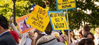 Suffrage march signs