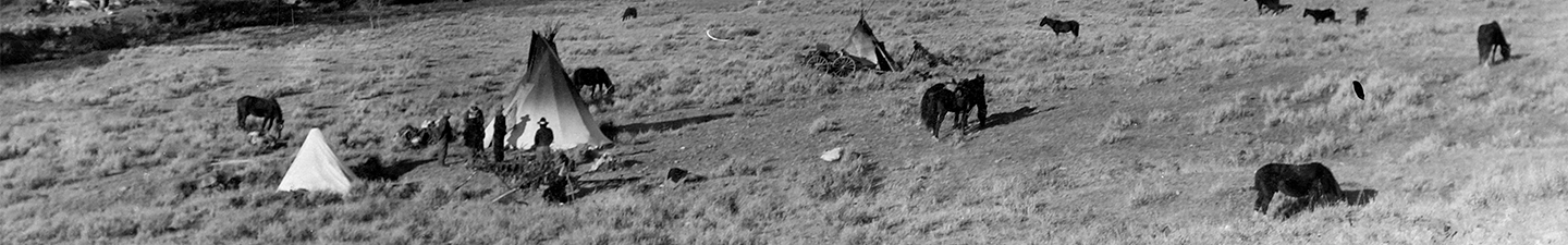 Ute Camp Near Wyoming-Montana Border dotted with tepees and Native American people.