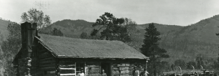 A Black family in their rural cabin