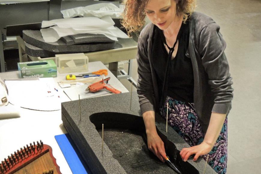 Kimberly Kronwall preparing object for loan