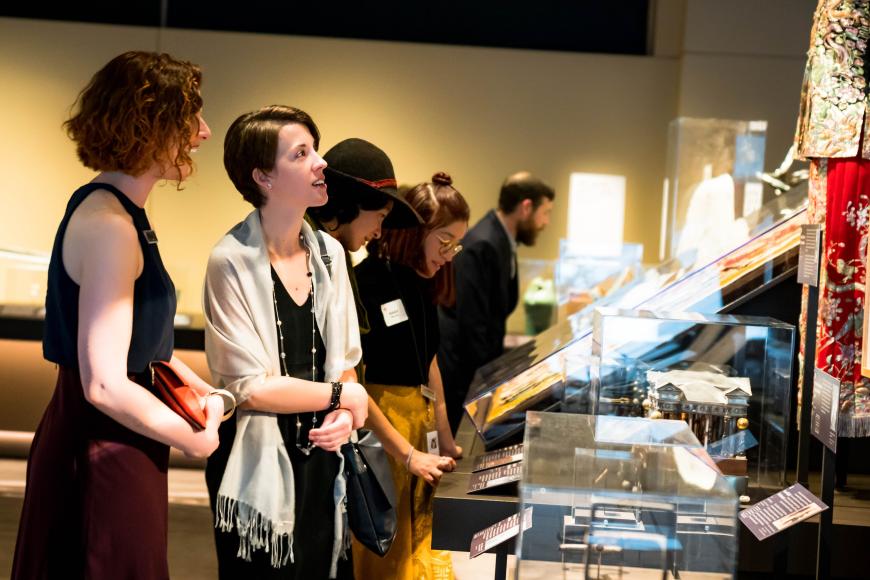 Visitors in Zoom In exhibit