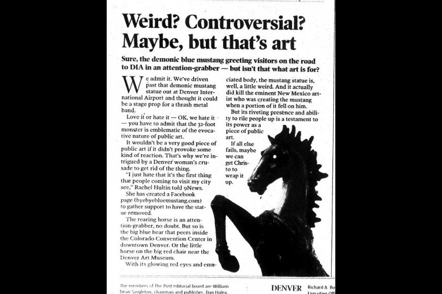 Newspaper article with silhouette of Blucifer