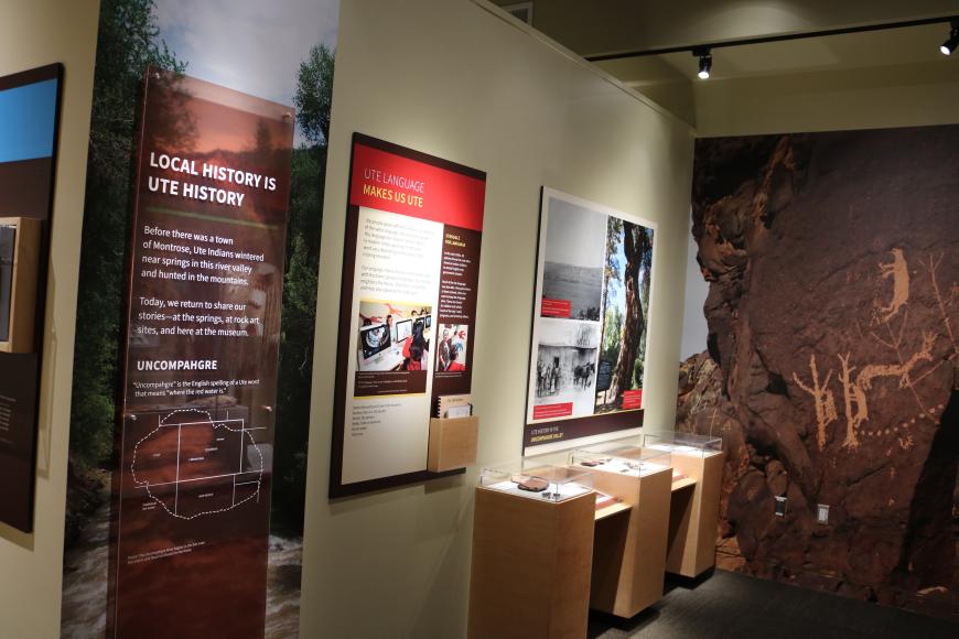 Panels at the main exhibit at the Ute Indian Museum. the panels depict color photos of modern Ute people, and one proclaims that Local History is Ute History.