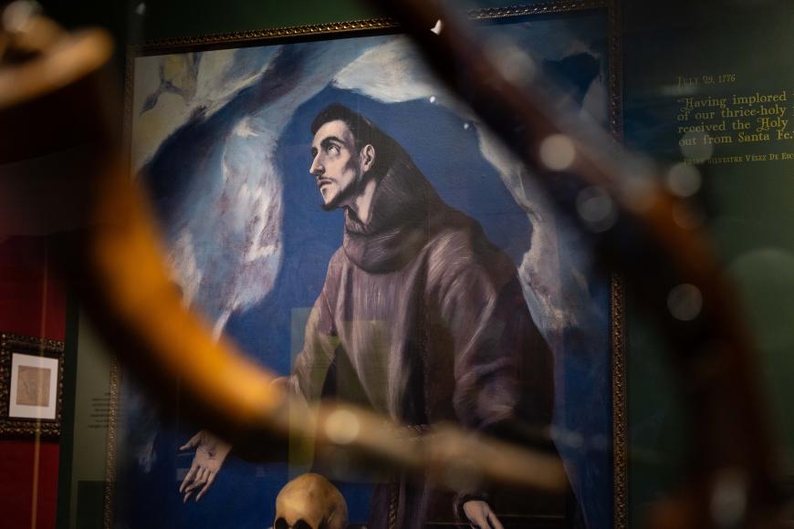 Artwork of a monk scene through the foreground of a horseshoe in the 1776 exhibition.