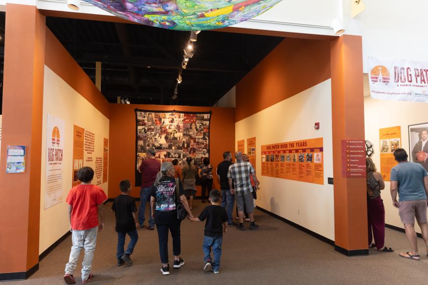 Colorful panels and quilt within Dog Patch exhibition