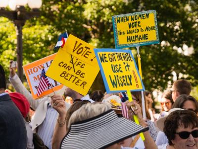 Suffrage march signs