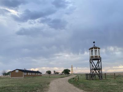 Barracks, guard tower, and water tower at Amache