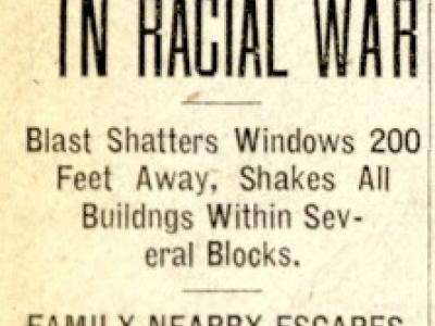 A clipping of a newspaper headline reading "Gilpin Street House Bombed in Racial War"
