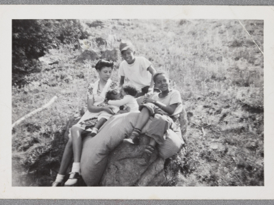 Nancy sitting with her infant sons Gary and Larry, next to her siblings Warren and Artie, outside the Zephyr View cabin