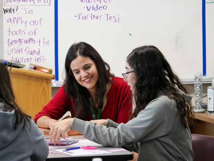 Marissa Volpe with Bruce Randolph School student during a museum of memory workshop. 