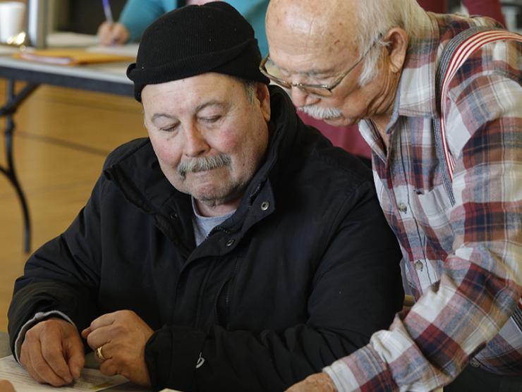 2 Avondale community members participating a memory workshop.