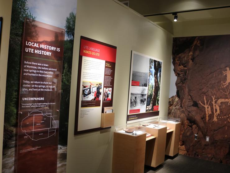 Panels at the main exhibit at the Ute Indian Museum. the panels depict color photos of modern Ute people, and one proclaims that Local History is Ute History.