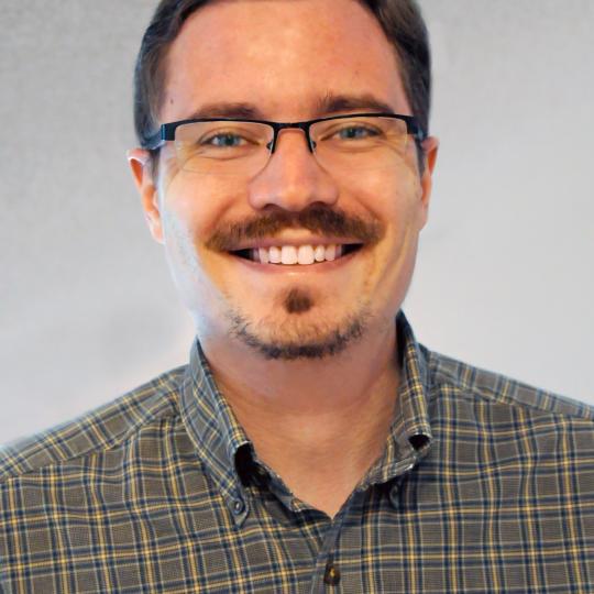 Kevin Smith, Associate Curator of Photography