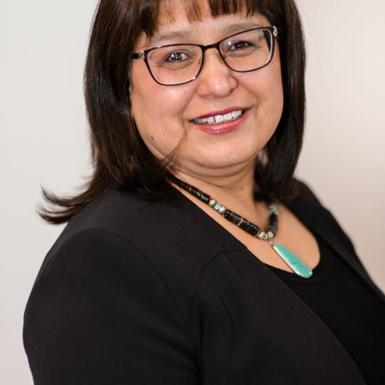 Portrait photograph of Adrianne Maddux